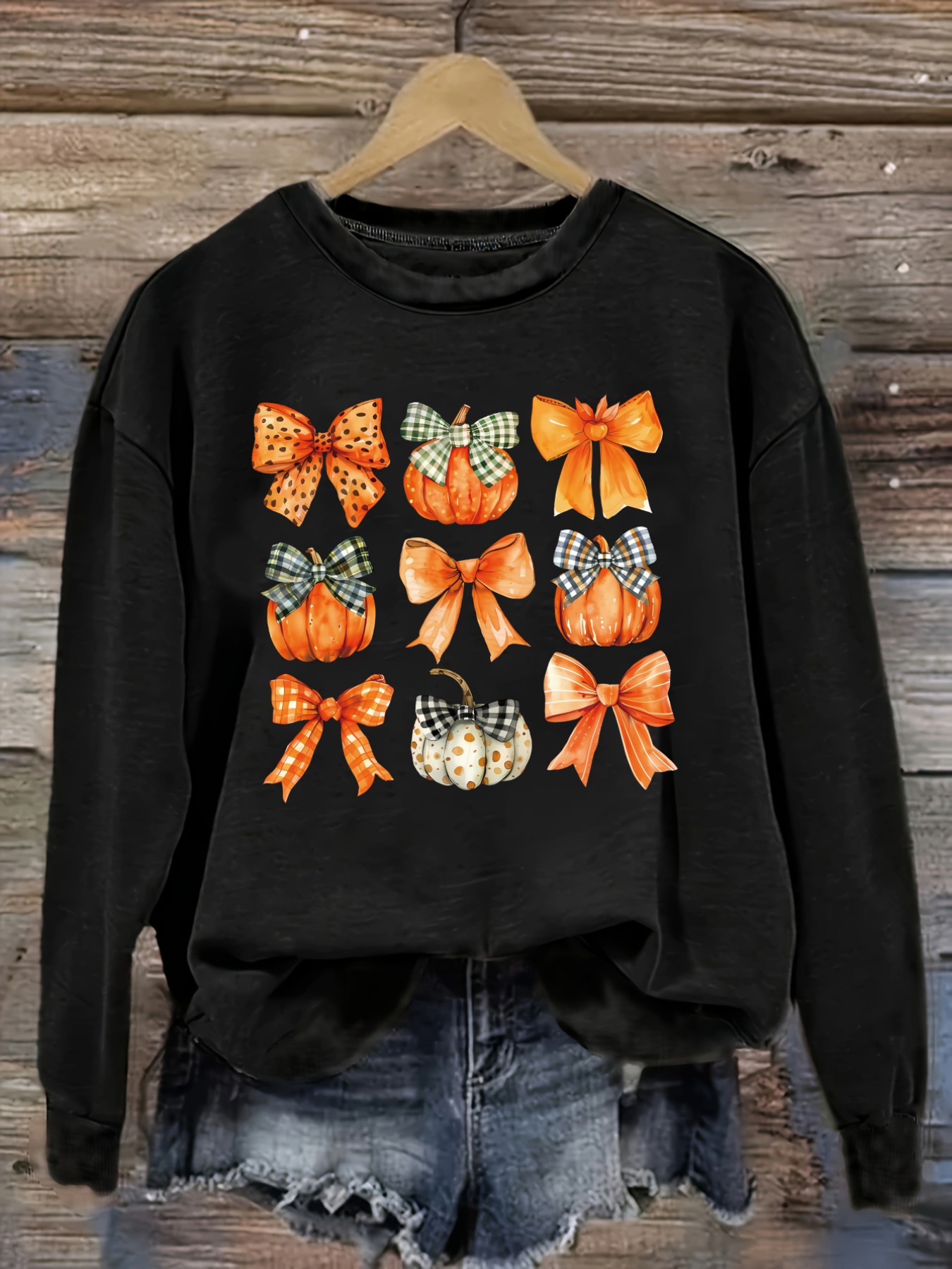 レディースカジュアル長袖クルーネックTシャツ、カボチャとリボ - Winter Clothing Design のレビューと価格