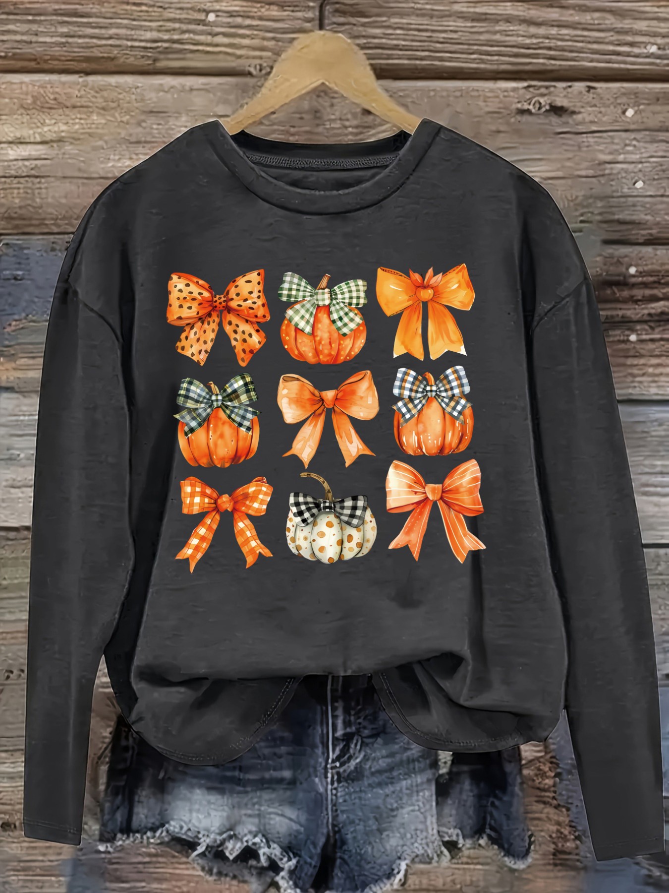 レディースカジュアル長袖クルーネックTシャツ、カボチャとリボ - Winter Clothing Design のレビューと価格