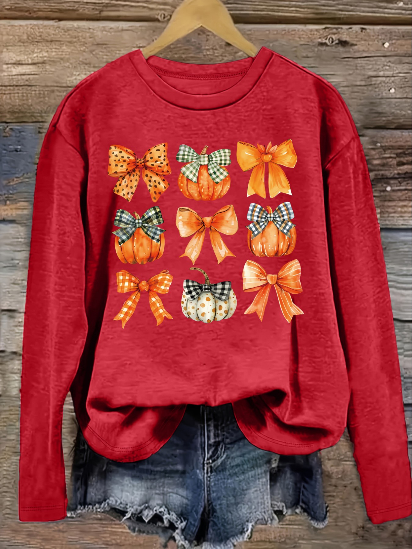 レディースカジュアル長袖クルーネックTシャツ、カボチャとリボ - Winter Clothing Design のレビューと価格
