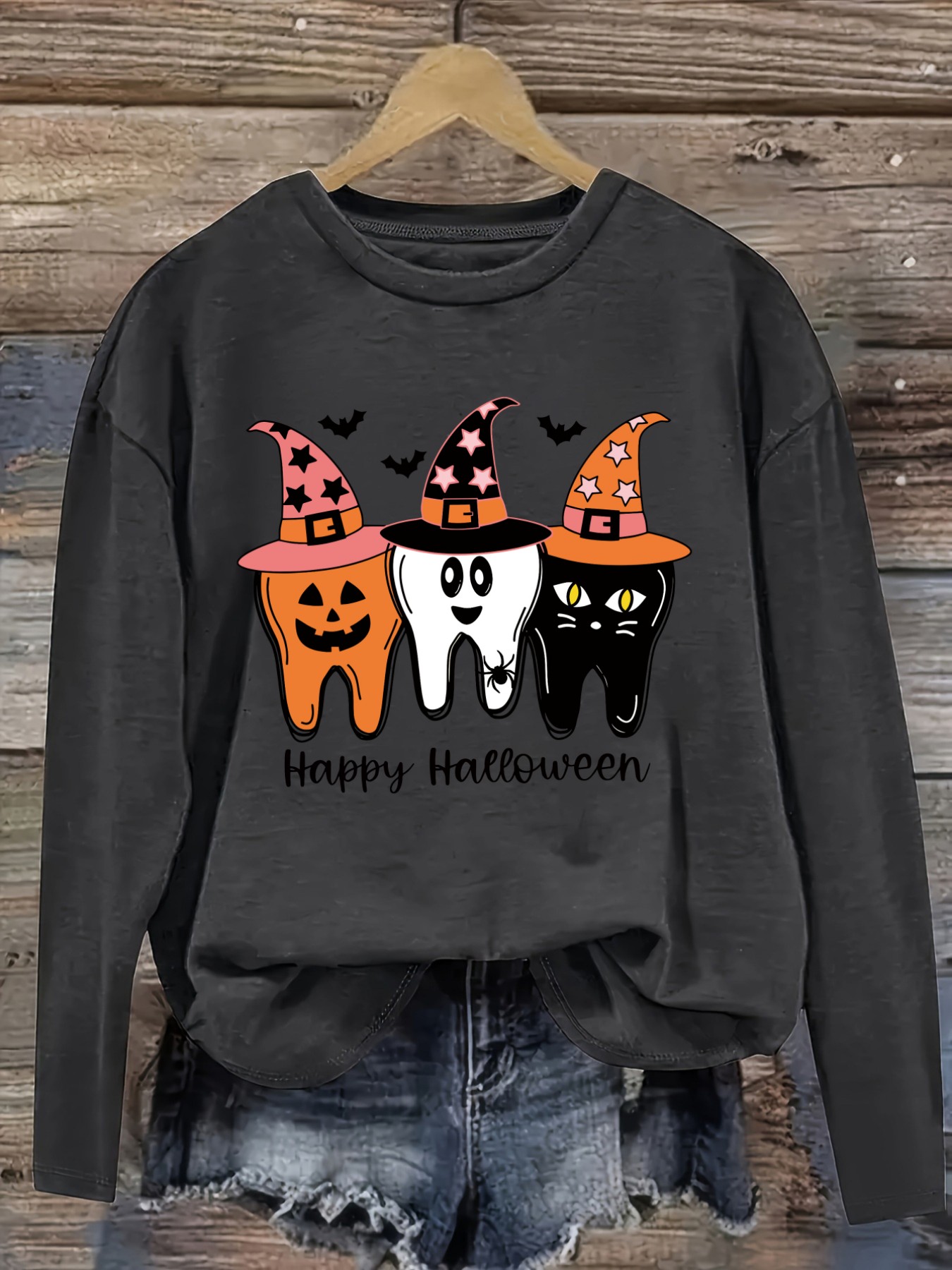 レディースカジュアル長袖クルーネックTシャツ、ハッピーハロウ - Winter Clothing Design のレビューと価格